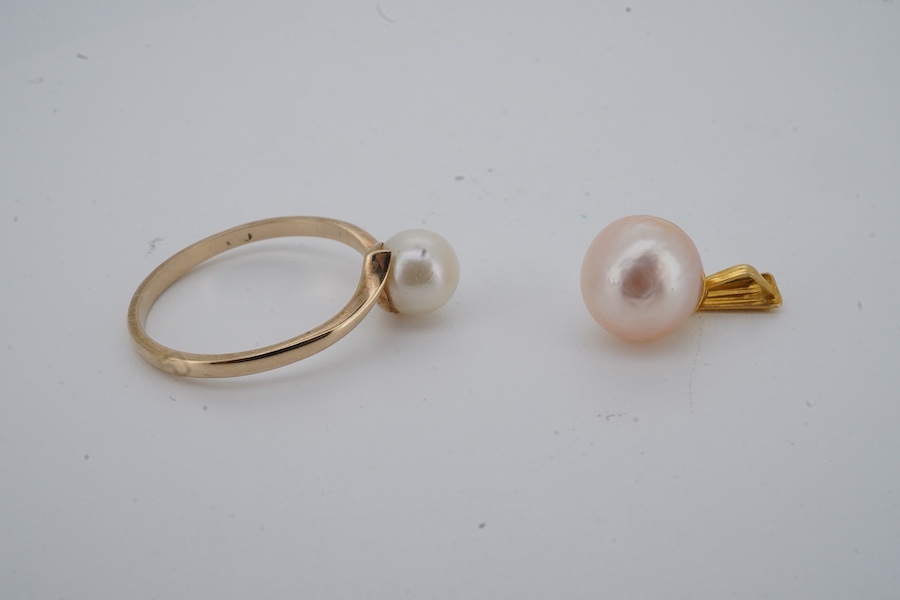 A cultured pearl ring and pendant, each set with a cultured pearl, the ring in 9ct gold, size N1/2, British hallmarks, gross weight approximately 1.5 grams, pendant length 1.7cm
